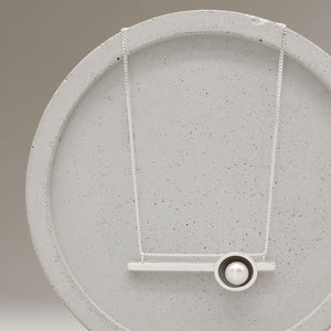 Close up of a layering pearl necklace handcrafted in oxidised sterling silver with a 5mm freshwater pearl.