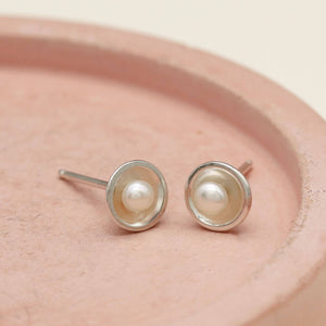 Tiny pearl stud earrings handmade in sterling silver with 3mm freshwater pearls