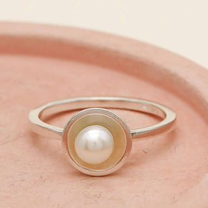 Handmade pearl stacking rings in sterling silver and oxidised silver finishes