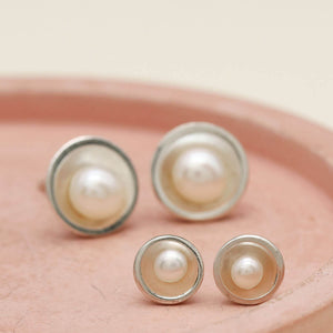 Small sterling silver pearl studs compared with the Classic size pearl earrings