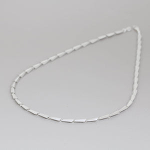 Sterling silver Art Deco link necklace showing its sculptural links, polished finish and distinctive modern design