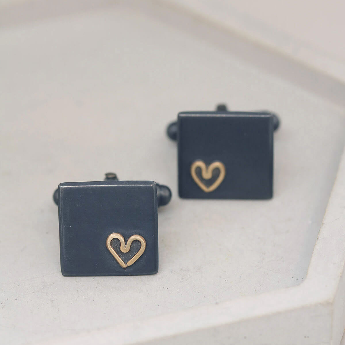 Handmade silver and gold Groom wedding cufflinks displayed flat, sentimental anniversary gift for husband from wife.