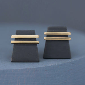 Front and angled view of Black and Gold cufflinks on deep blue background, ideal special cufflinks for Christmas gifting or graduation presents.