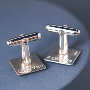 Personalised motorbike cufflinks on a deep blue background, meaningful gifts for a biker dad to wear on special occasions