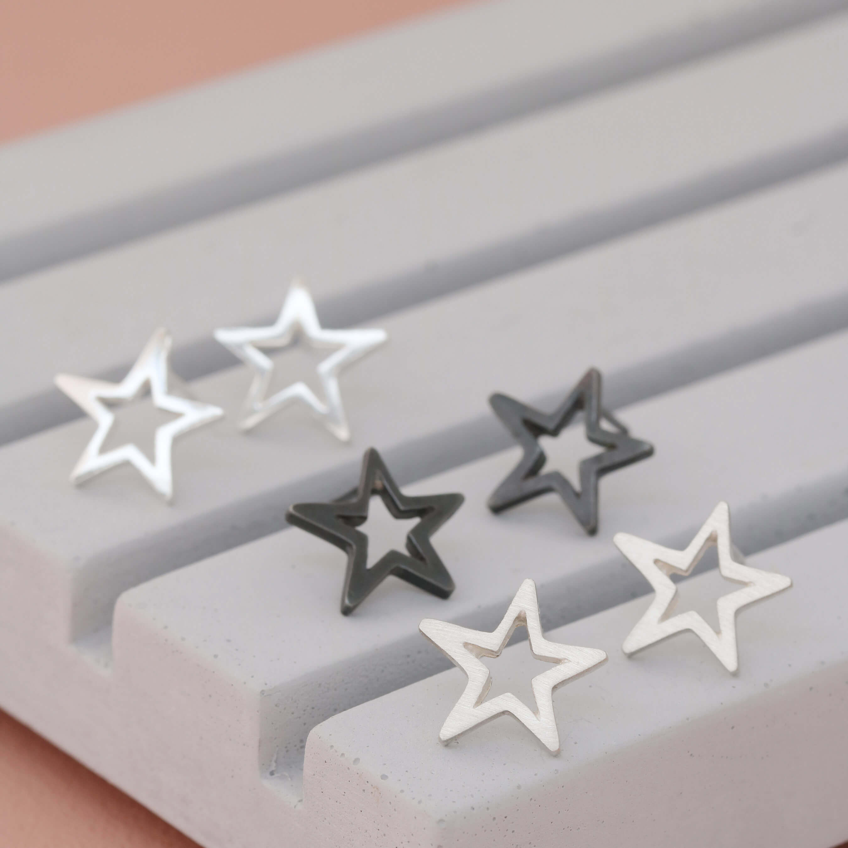 Star sterling silver earrings in polished, matte, and oxidised finishes, perfect good luck gift for her