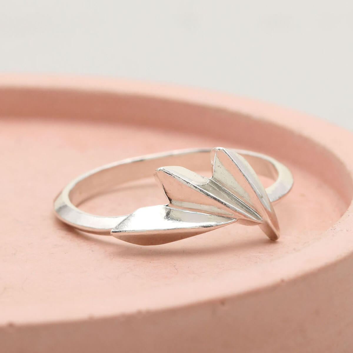 Art Deco-inspired statement ring in sterling silver, showing the bold fan-shaped design and clean geometric lines