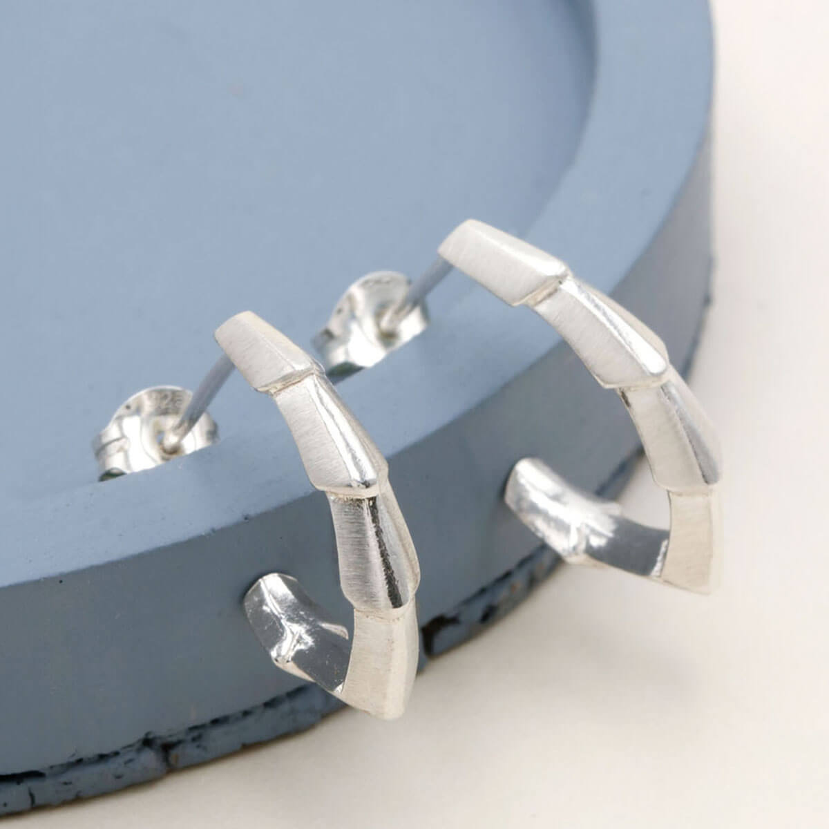 Unique handmade silver earrings in a half hoop design, thoughtful gift for someone who loves Art Deco jewellery