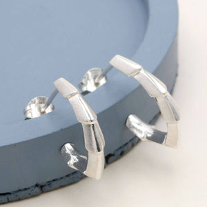 Unique handmade silver earrings in a half hoop design, thoughtful gift for someone who loves Art Deco jewellery