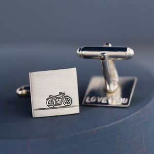 Motorbike cufflinks on a deep blue background, ideal gifts for a biker dad on his birthday or Father’s Day