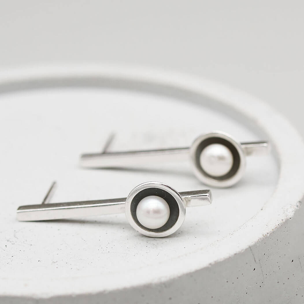 Handmade long black pearl earrings with elongated sterling silver bars and genuine 5mm freshwater pearls.