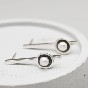 Handmade long black pearl earrings with elongated sterling silver bars and genuine 5mm freshwater pearls.