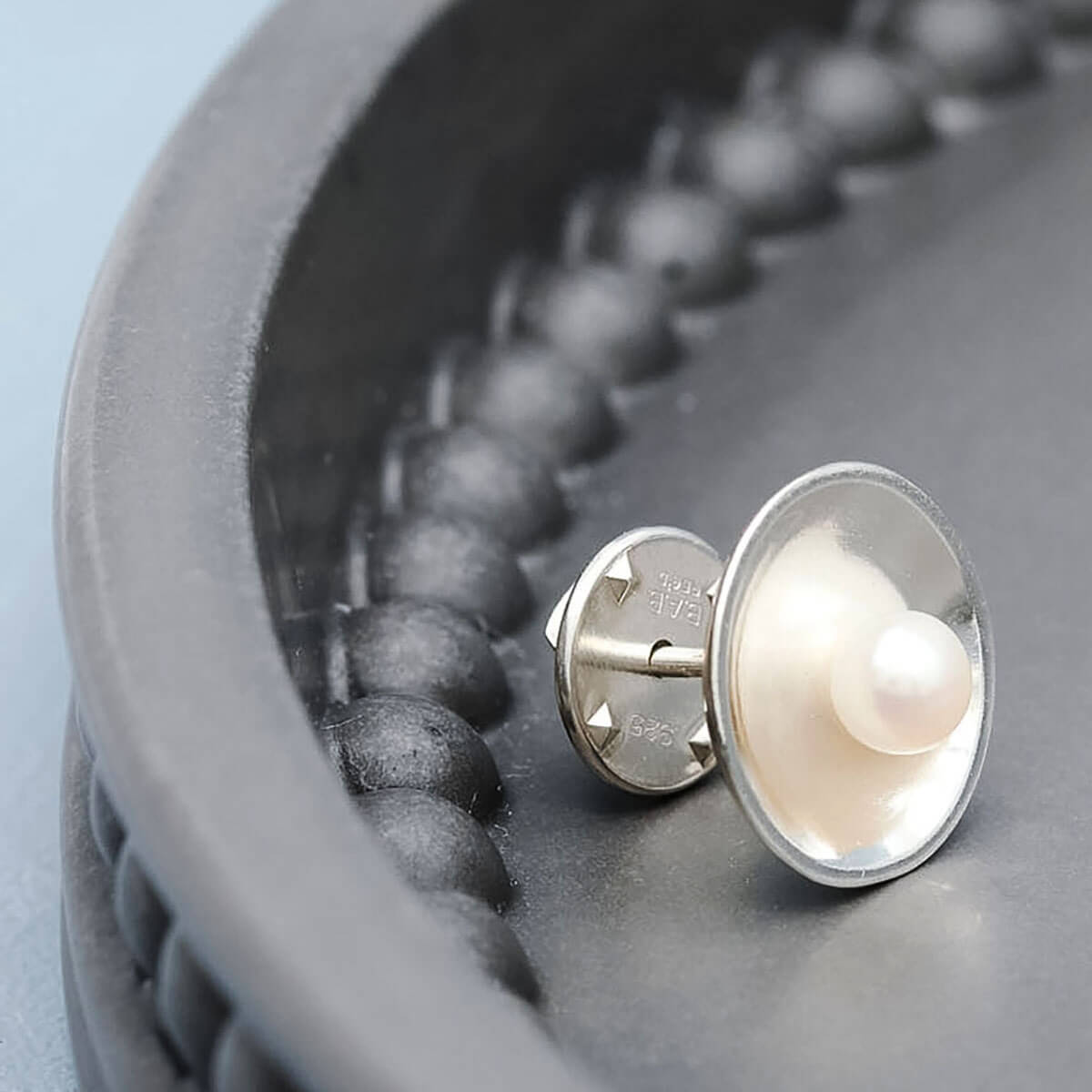 Handmade pearl tie pin crafted in solid sterling silver with a genuine freshwater pearl centre.