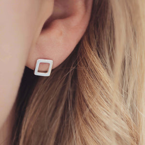 Model wearings Square silver stud earrings, elegant small square stud earrings