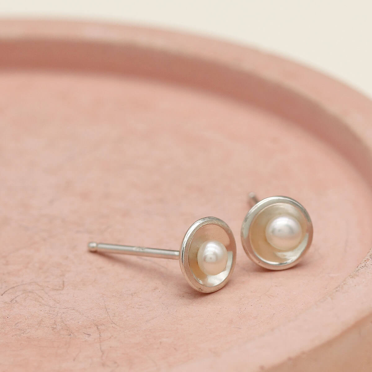 Petite sterling silver pearl earrings inspired by Art Deco design