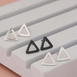Silver Triangle Earrings in polished, matte and oxidised finishes on grey dish