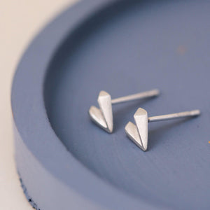 Silver heart stud earrings on blue dish, love heart earrings perfect Valentine’s Day gift for her