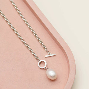 Sterling silver toggle pearl necklace featuring a polished T-bar clasp and a large 12mm freshwater pearl pendant.
