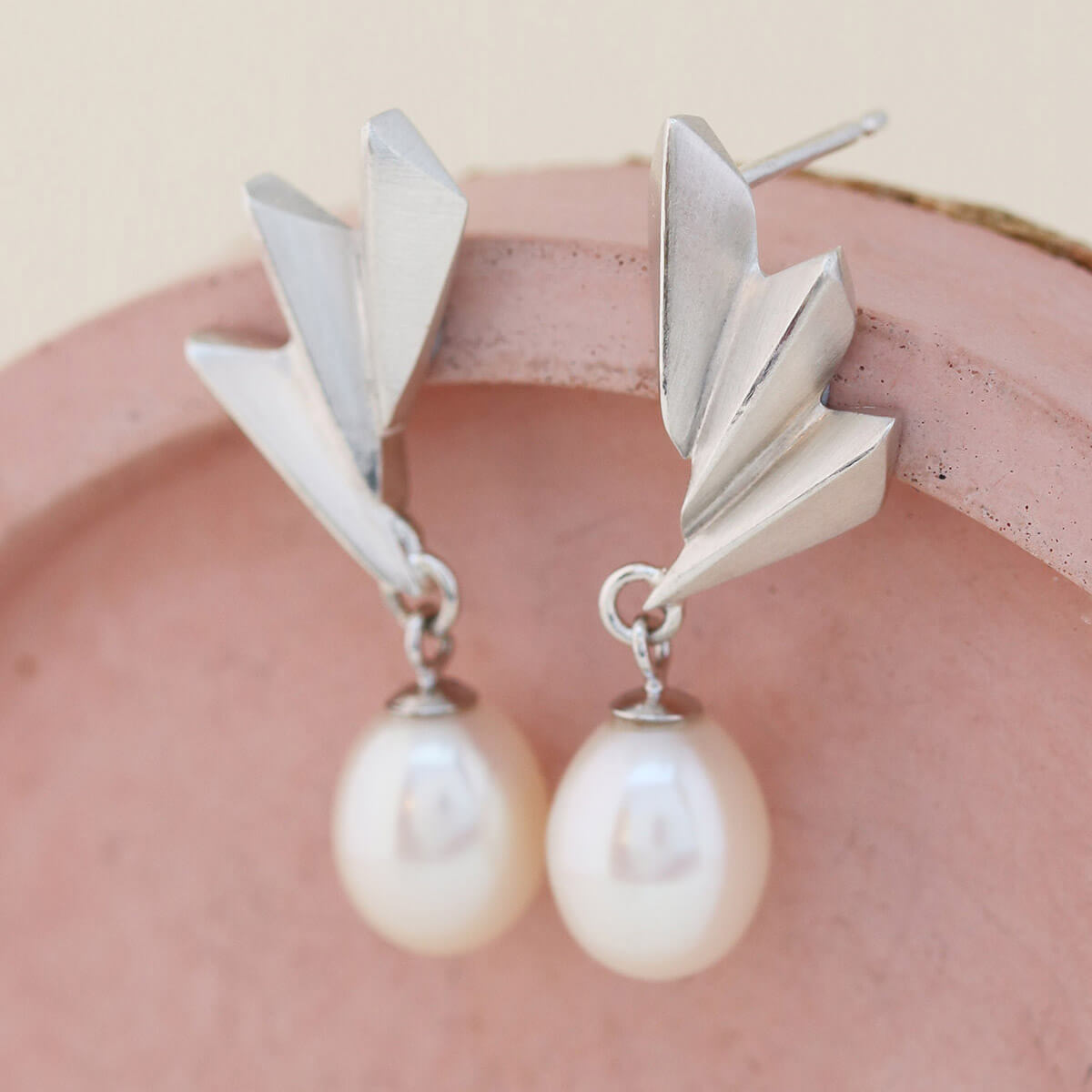 Pearl earrings in a Louy Magroos gift box, showcasing the Art Deco silver fan design — perfect gifting choice for weddings or milestone celebrations.