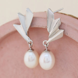 Pearl earrings in a Louy Magroos gift box, showcasing the Art Deco silver fan design — perfect gifting choice for weddings or milestone celebrations.