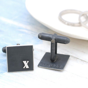 silver and black 10th anniversary cufflinks