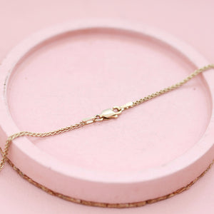 Gold necklace clasp