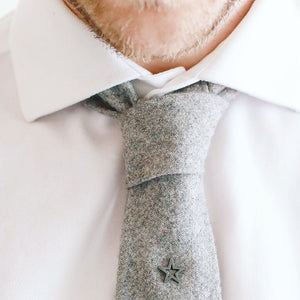 Black tie pin