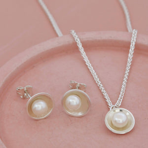 matching pearl necklace and earrings