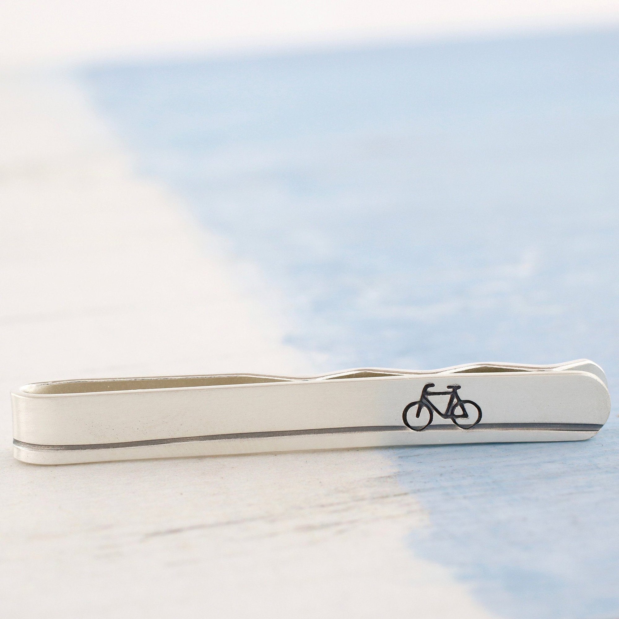 silver bike tie clip